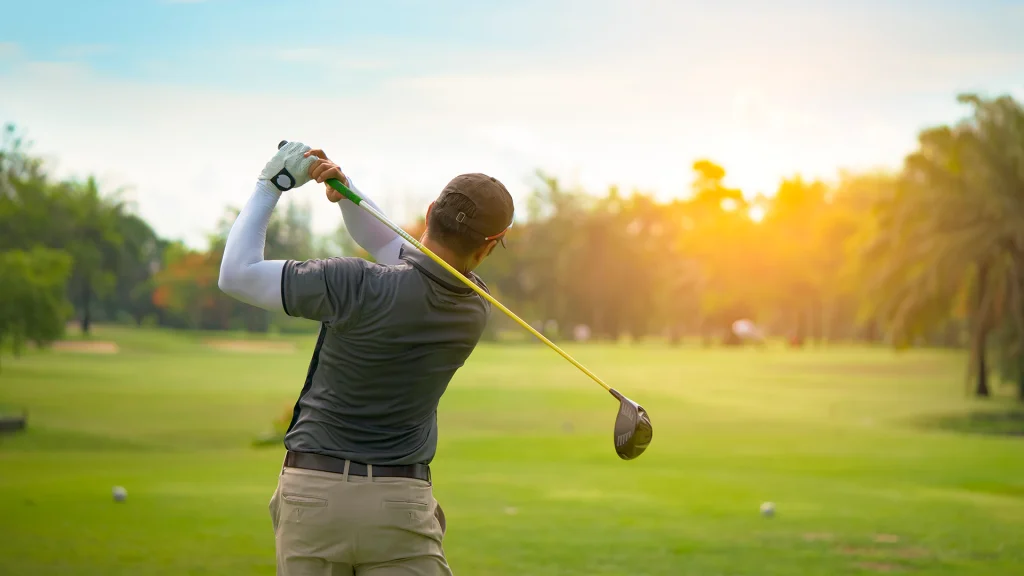 A man enjoying a round of golf at a course in Scottburgh, near the Anchored Inn